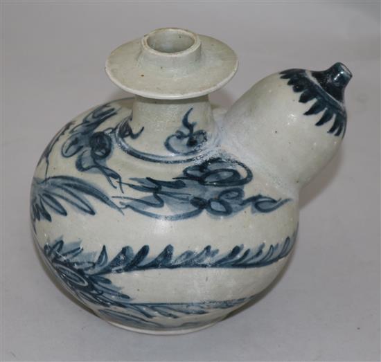 An Annamese blue and white porcelain kendi, 15th century, 15.5cm, sea-etched glaze